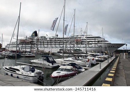 KLAIPEDA,LITHUANIA- JUNE 27:Sailing boats and cruise liner in the harbor at summer on June 27,2012 in Klaipeda,Lithuania.is the third largest city in Lithuania and the capital of Klaip?da County.