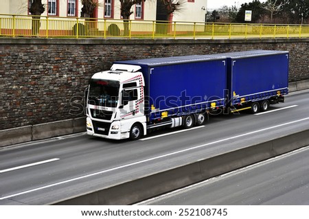 MAINZ,GERMANY-FEB 09:MAN truck on the highway on February 09,2015 in Mainz,Germany.MAN SE, formerly MAN AG, is a German mechanical engineering company and parent company of the MAN Group.