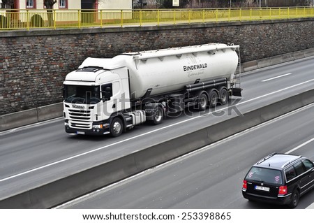 MAINZ,GERMANY-FEB 09:SCANIA white oil truck on the highway on February 09,2015 in Mainz,Germany.Scania, is a major Swedish automotive industry manufacturer of  specifically heavy trucks and buses.