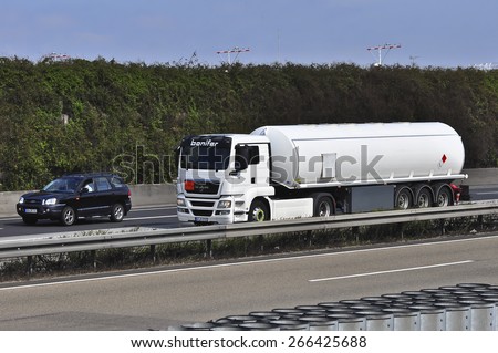 FRANKFURT,GERMANY-MARCH 28:NAN oil truck on the highway on March 28,2015 in Frankfurt,Germany.MAN SE, formerly MAN AG, is a German mechanical engineering company and parent company of the MAN Group.