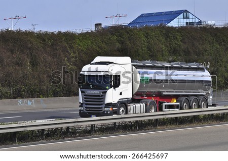FRANKFURT,GERMANY-MARCH 28: Scania oil truck on the highway on March 28,2015 in Frankfurt,Germany.Scania, is a major Swedish automotive industry manufacturer of specifically heavy trucks and buses.