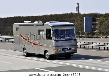FRANKFURT,GERMANY-MARCH 28:MAN van on the highway on March 28,2015 in Frankfurt,Germany.MAN SE, formerly MAN AG, is a German mechanical engineering company and parent company of the MAN Group.