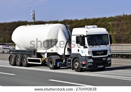 FRANKFURT,GERMANY-MARCH 28:MAN oil truck on the highway on March 28,2015 in Frankfurt,Germany. MAN SE, formerly MAN AG, is a German mechanical engineering company and parent company of the MAN Group.