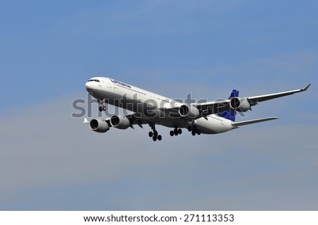 FRANKFURT,GERMANY-MARCH 28:Airplane of Lufthansa above the Frankfurt airport on March 28,2015 in Frankfurt,Germany. Lufthansa AG is a German airline and also the largest airline in Europe.