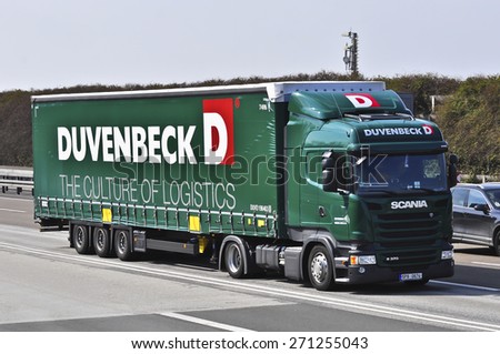 FRANKFURT,GERMANY-MARCH 26:SCANIA truck on the highway on March 26,2015 in Frankfurt,Germany.Scania, is a major Swedish automotive industry manufacturer of specifically heavy trucks and buses.