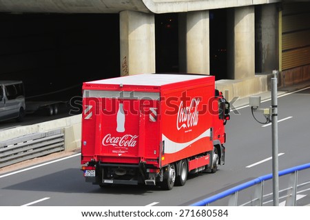 FRANKFURT,GERMANY-APRIL 16:red Coca- Cola truck  on April 16,2015 in Frankfurt,Germany.Coca-Cola is a carbonated soft drink sold in stores, restaurants, and vending machines throughout the world