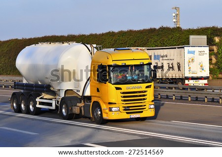 FRANKFURT,GERMANY-APRIL 10:SCANIA oil truck on the highway on April 10,2015 in Frankfurt,Germany.Scania, is a major Swedish automotive industry manufacturer of specifically heavy trucks and buses.