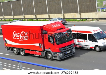 FRANKFURT,GERMANY-APRIL 16:red Coca- Cola truck on April 16,2015 in Frankfurt,Germany.Coca-Cola is a carbonated soft drink sold in stores, restaurants, and vending machines throughout the world