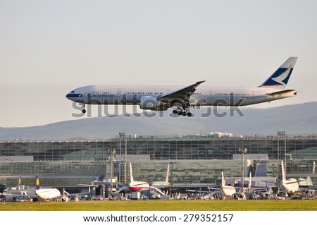FRANKFURT,GERMANY-MAY 13:airplane of Cathay Pacific above the Frankfurt airport on May 13,2015 in Frankfurt,Germany.