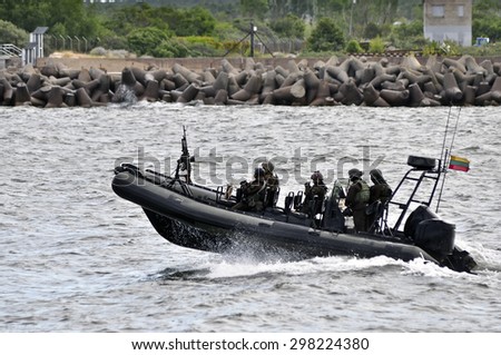 KLAIPEDA,LITHUANIA-JULY 17:military boat patrolling in port Klaipeda on July 17,2015 in Klaipeda,