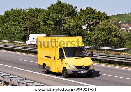 FRANKFURT,GERMANY - JULY 31: DEUTSCHE POST truck on the highway on July 31, 2015 in Frankfurt, Germany.Deutsche Post AG is the world\'s largest courier company.