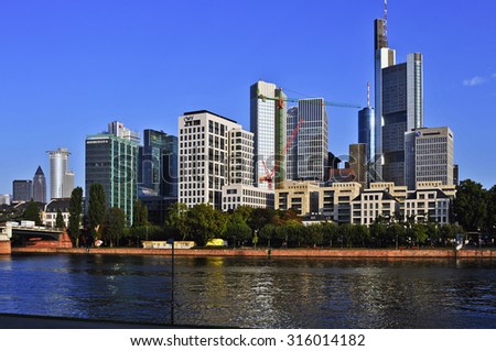 FRANKFURT,GERMANY-SEPT 11:Frankfurt's Skyline by Main River on September 11,2015 in Frankfurt,Germany. Frankfurt is the financial center of Germany. Frankfurt is the financial center of Germany.