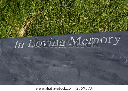 a stone in memory of a person