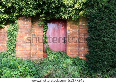 red gate leading to a secret garden