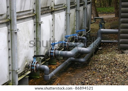 pipes connecting the heating and air conditioning to log cabins