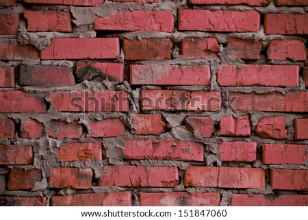 Background based on the brickwork of the cracked and weathered stained rough brick. Art edition. Rustic vermilion (crimson) stylized brick.