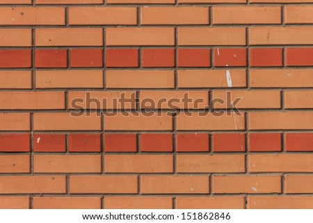 Background, fabricated on the basis of accurate brickwork of a molded (shaped) brick.