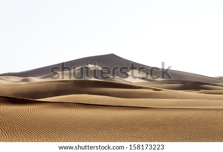Morocco, Hamada du Draa (stone desert) different colored sand dunes in a sunny day