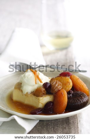 flan with fruit compote and cream