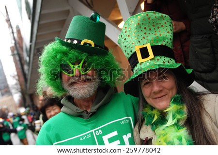 VANCOUVER, CANADA - MARCH 17, 2013: Thousands of people have crowded downtown Vancouver to take part in St. Patrick\'s Day parade and celebrations in Vancouver, Canada, on March 17, 2013.
