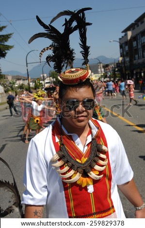 VANCOUVER, CANADA - AUGUST 12, 2012: Hundreds of costumed revellers took part in the Pinoy Fiesta, the annual Filipino Cultural Parade, in Vancouver, Canada, on August 12, 2012.