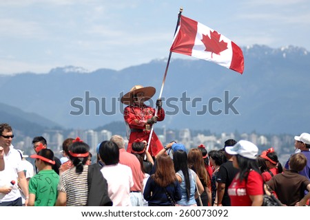 VANCOUVER, CANADA - JULY 1, 2013: Thousands of people gathered in downtown to take part in Canada Day celebrations in Vancouver, Canada, on July 1, 2013.
