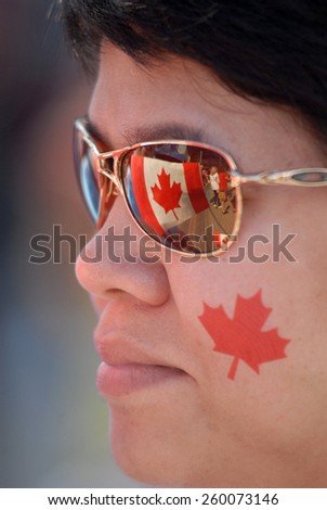 VANCOUVER, CANADA - JULY 1, 2013: Thousands of people gathered in downtown to take part in Canada Day celebrations in Vancouver, Canada, on July 1, 2013.