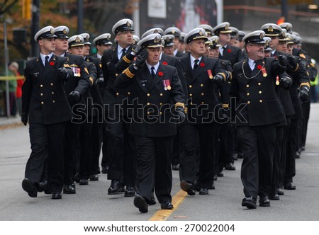 VANCOUVER, CANADA - NOVEMBER 11, 2013: Canadian veterans and military personnel participated in Remembrance Day ceremony and parade at the Victory Square in Vancouver, Canada, on November 11, 2013.