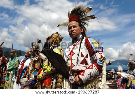 WEST VANCOUVER, CANADA - JULY 8, 2012: Native Indian people participate in the annual Squamish Nation Pow Wow in West Vancouver, British Columbia, Canada, July 8, 2012.