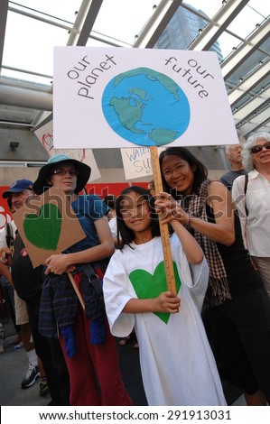 VANCOUVER, CANADA - SEP. 21, 2014: Thousands of people took part in the People's Climate March calling world leaders' attention to global warming, Vancouver, Canada, on Sep. 21, 2014.