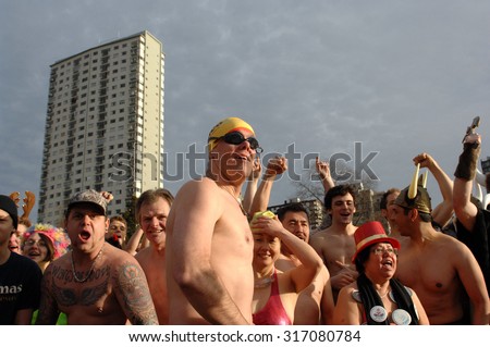 VANCOUVER, CANADA - JANUARY 1, 2012: Hundreds of people participated in the 92nd annual Polar Bear Swim 2012 in Vancouver, Canada, January 1, 2012.