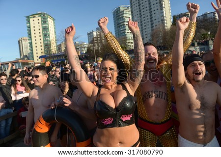 VANCOUVER, CANADA - JANUARY 1, 2015: Hundreds of people participated in the 95th annual Polar Bear Swim 2015 in Vancouver, Canada, January 1, 2015.