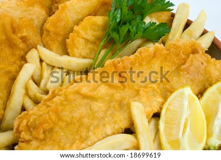 Freshly cooked Fish and Chips with Potato Cakes