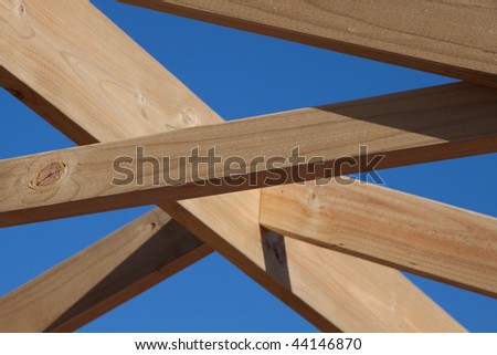 Horizontal image of timber roof frame under construction