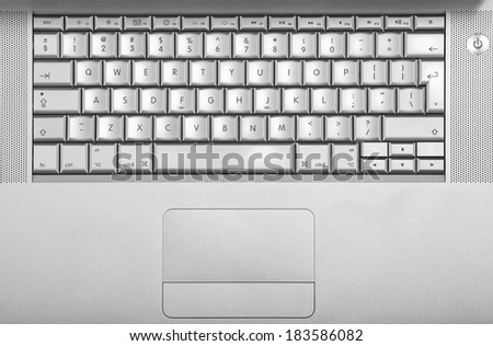 A Computer Keyboard. Close up shot of an apple laptop keyboard