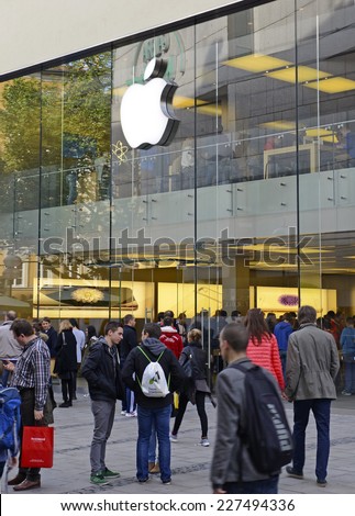 MUNICH -CIRCA OCTOBER, 2014. Loyal customers brave crowds inside and outside the Apple Store in the heart of Munich\'s main city square for the iPhone 6 which recently went on sale in Germany.