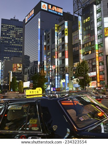 TOKYO - CIRCA NOVEMBER 2014. Despite reports of a slowing Japanese economy, the neon lights of Shinjuku reflect a vibrant hub of retail and commercial business, restaurants and entertainment.