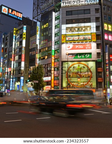 TOKYO - CIRCA NOVEMBER 2014. Despite reports of a slowing Japanese economy, the neon lights of Shinjuku reflect a vibrant hub of retail and commercial business, restaurants and entertainment.