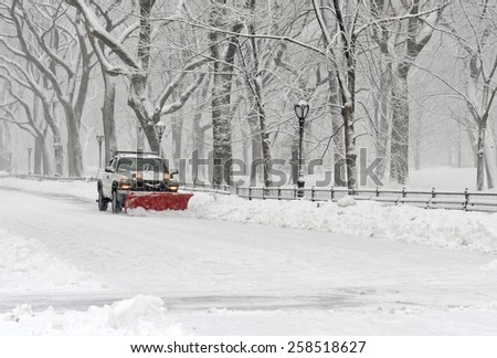 NEW YORK CITY - MARCH 5, 2015. A late season snowfall dumped over eight inches of snow and had the streets of New York City filled with trucks with plows removing snow all day after the storm.