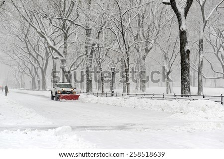 NEW YORK CITY - MARCH 5, 2015. A late season snowfall dumped over eight inches of snow and had the streets of New York City filled with trucks with plows removing snow all day after the storm.
