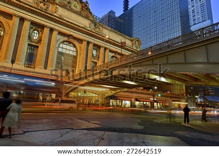 Grand Central Terminal, Manhattan, New York showing fast paced motion concept with blurred traffic and pedestrians