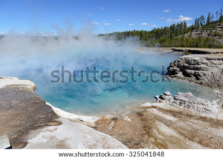 Yellowstone National Park is a volcanically active area, filled with geothermal activity of steam vents, hot springs and geysers
