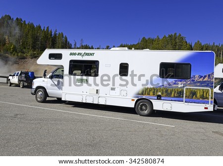 YELLOWSTONE NATIONAL PARK, WYOMING - CIRCA SEPTEMBER 2015. Recreational Vehicles or RVs are an increasingly popular way for tourists to visit National Parks such as volcanically active Yellowstone.