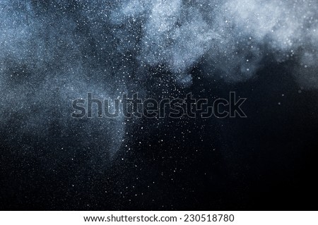 abstract white powder explosion  on black background