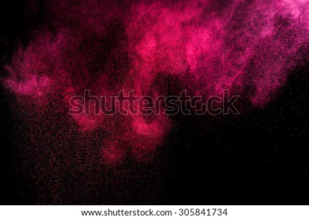 Abstract pink paint Holi. Abstract pink powder explosion on black background. Abstract texture. Design elements.