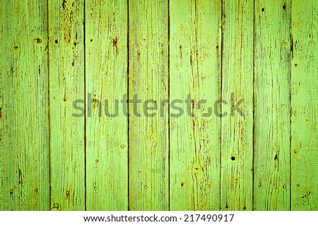 green wood texture background. old wood planks painted with green color