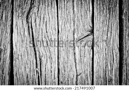cracked wood texture background. closeup of dark old wood planks.