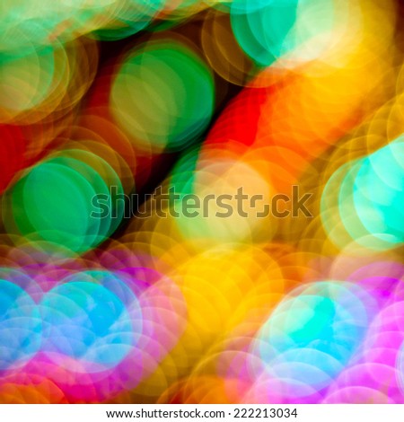 Blurred colorful lights background. Christmas defocused lights background. Bokeh sparkling lights. Abstract colorful background.