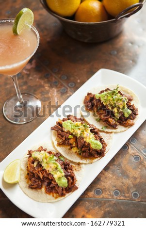 Tacos al Pastor with a mango margarita