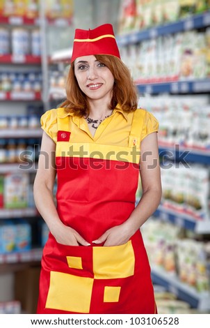 portrait woman seller in food supermarket